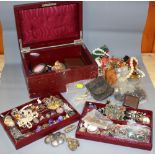 A jewellery box containing a large selection of silver and other costume jewellery, various