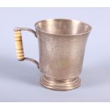 An Art Deco silver christening mug with turned ivory handle, 4.1oz troy approx