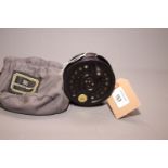 A Hardy Sovereign 2000 fishing reel, in canvas pouch