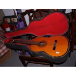 An Eko Rio Grand VI acoustic guitar, in case, and an Eko model 649 Spanish guitar, in fitted case