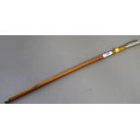 A swagger stick with silver plated pommel decorated crest of Hampshire Regiment
