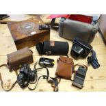 A collection of cameras, lenses, etc, in camera bag, and a Victorian walnut writing box