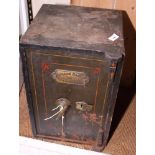 A Midland steel safe with key, 12" x 13" x 20" high