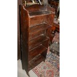 A 20th century dark stained open bookstand, 18" wide
