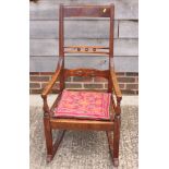 A Victorian mahogany bar back rocking chair with drop-in seat (for reupholstery)