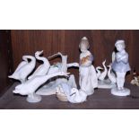 Three Lladro porcelain figures of geese, a similar Nao figure, a Lladro figure of a girl and a