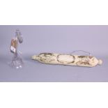 A 19th century white glass rolling pin decorated ships and a glass French horn