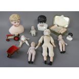 A quantity of small bisque jointed dolls, half dolls, etc