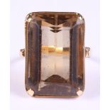 An 18ct gold, citrine single stone dress ring, size K, 7.7g