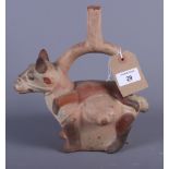A Peruvian terracotta flask, in the shape of a man on a horse, 9 1/2" high