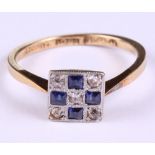 An 18ct gold and platinum, sapphire and diamond set plaque ring, size K, 1.9g