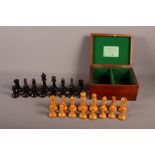 A Jaques set of ebony and box Staunton chessmen with weighted bases, in mahogany box, king 4 1/2"