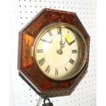 A 19th century rosewood and brass inlaid octagonal wall clock with weight, 9" dia (missing