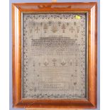 An early 19th century needlepoint sampler, by N Hewitt Nottingham, with scripture verse, 18" x