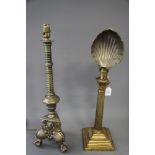 A brass Corinthian column table lamp, fitted metal shell shade, and another gilt metal table lamp,