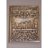 A 19th century "castle top" card case by Edward Smith, decorated in high relief to one side with a