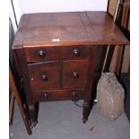 A William IV washstand with hinged top and drop leaves, fitted lower cupboard and drawer, on