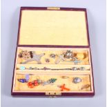 A selection of silver and other jewellery including silver gilt and enamel egg pendants, hardstone