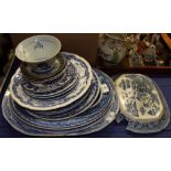 A collection of assorted blue and white transfer decorated plates, etc