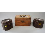 A 19th century mahogany box, fitted brass central carrying handle, and two smaller tea caddies (