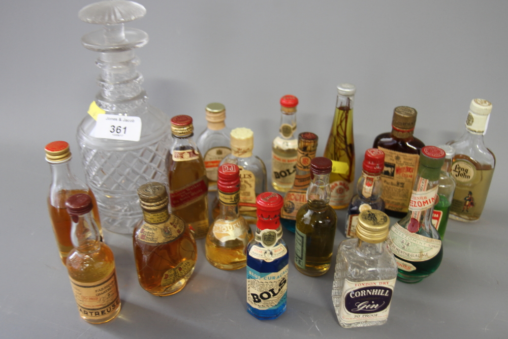 Eighteen miniature bottles of whisky and liqueurs and a 19th century glass decanter and stopper