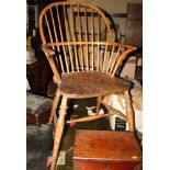 A 19th century ash and elm Windsor hoop and spindle back armchair, on turned underframe