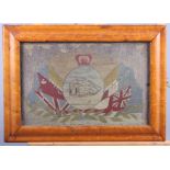 A 19th century sailor's woolwork panel, flags of nations and sailing boat, 9" x 11", in maple frame,