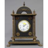 A 19th century French mantel clock, in ebonised and gilt metal decorated case, brass movement with