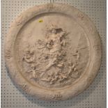 A circular cream plaster wall plaque, moulded figure of Flora with numerous cherubs, 25" dia (