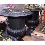A black painted cast iron garden urn, on square base, and a similar urn, 14" high (edge damaged)