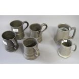 Four Victorian pewter measures (one converted to a jug) and two modern pewter tankards