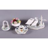 A 19th century Continental porcelain inkwell, a Continental porcelain posy basket, a Lladro model of