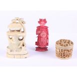 A Chinese ivory coloured cylindrical box and cover decorated figures, buildings and trees, a Chinese