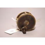 A Hardy 2 1/2" brass fishing reel with black finish