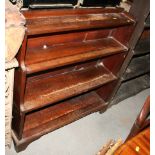 A stained as mahogany three-shelf waterfall bookcase, on bracket supports, 36" wide