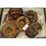 Seven assorted wooden and Bakelite fishing reels