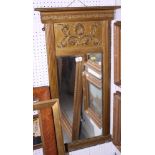 A 19th century gilt framed overmantel mirror with scroll decorated frieze panel and bevelled