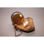 A Hard Bros 3 3/4" Perfect fishing reel with brass face and ivorine handle, in canvas bag