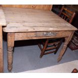 A 19th century pine kitchen table, fitted drawer, on turned supports, 42" x 33"