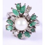 An 18ct white gold, diamond, emerald and pearl dress ring, size O, 7.3g