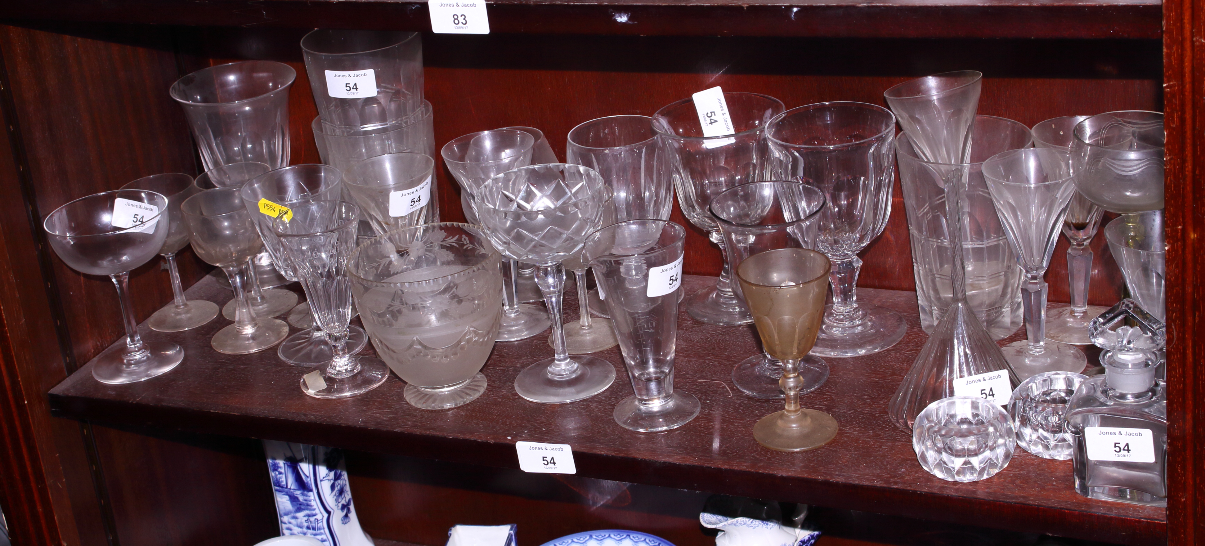 A large collection of assorted drinking glasses, etc