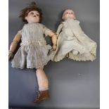 An Armand Marseille bisque headed doll with sleeping eyes and jointed composition body, 24" high,