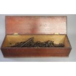 A collection of 18th/19th century iron keys, in wooden box