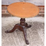 A 19th century carved oak occasional table with leather top (made up)