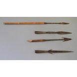 Four barbed spear heads, various, 8 1/2" long