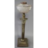 A brass Corinthian column oil lamp with glass reservoir, 25" high (burner missing)