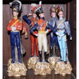 A set of six Capodimonte figures of soldiers in 19th century uniforms, 12" high