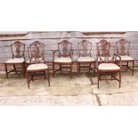 A set of eight Georgian design mahogany shield back dining chairs with backs carved wheat ears (6+