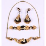 A Victorian gilt metal onyx and pearl necklace, earring and brooch set with vine leaf decoration