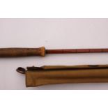 A Hardy Tournament 11 foot rod with spare tip and canvas case